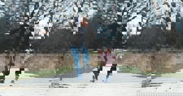 Dad Running With Kid