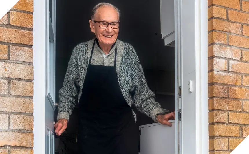 Smiley Older Man Opening Door CROP