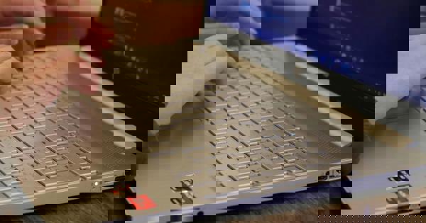 Typing On A Laptop Alain Youssef